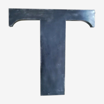 Letter t in metal