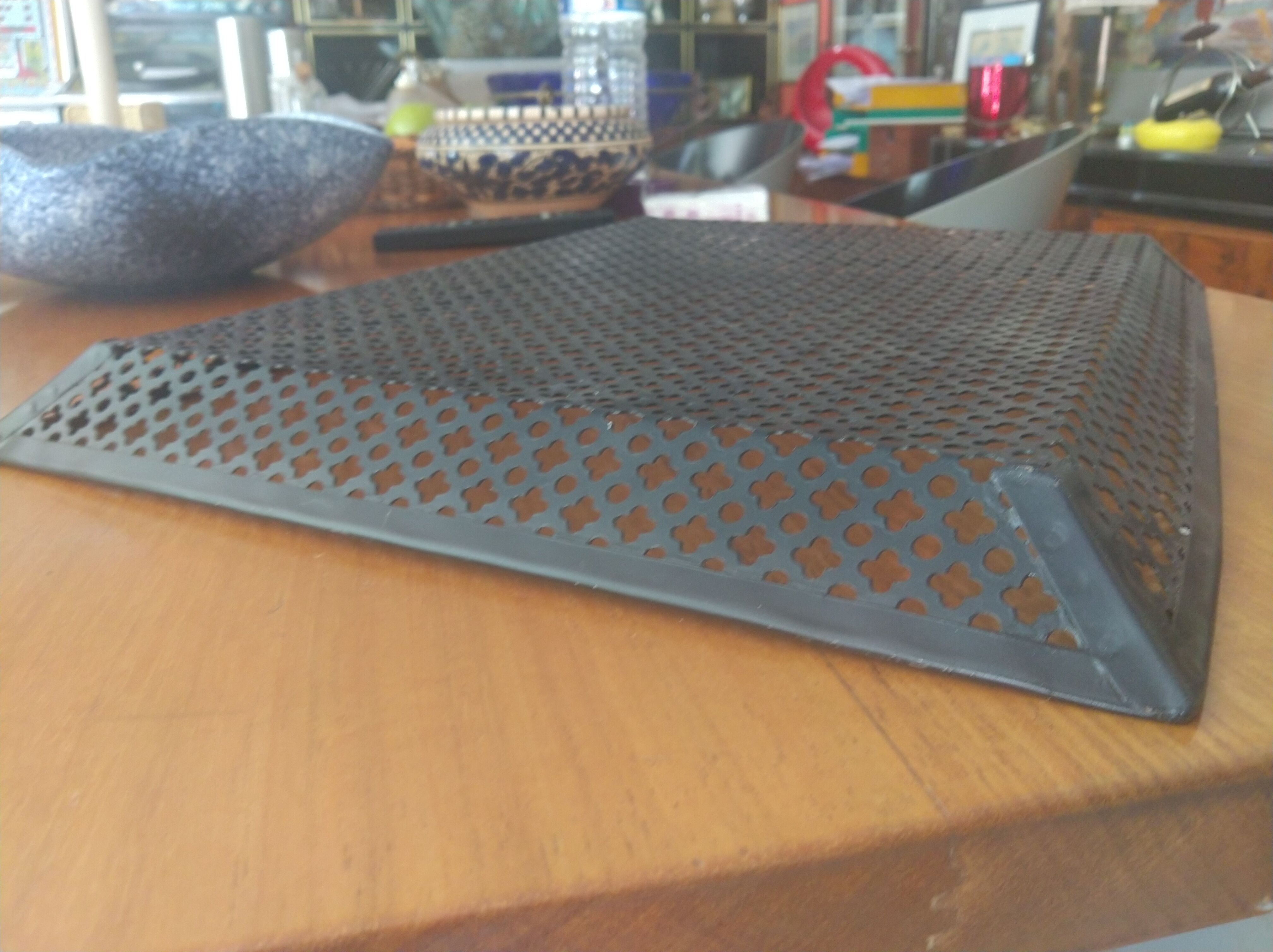 Perforated sheet metal tray, circa 1950