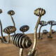 Set of six hammered Art Deco coat hooks