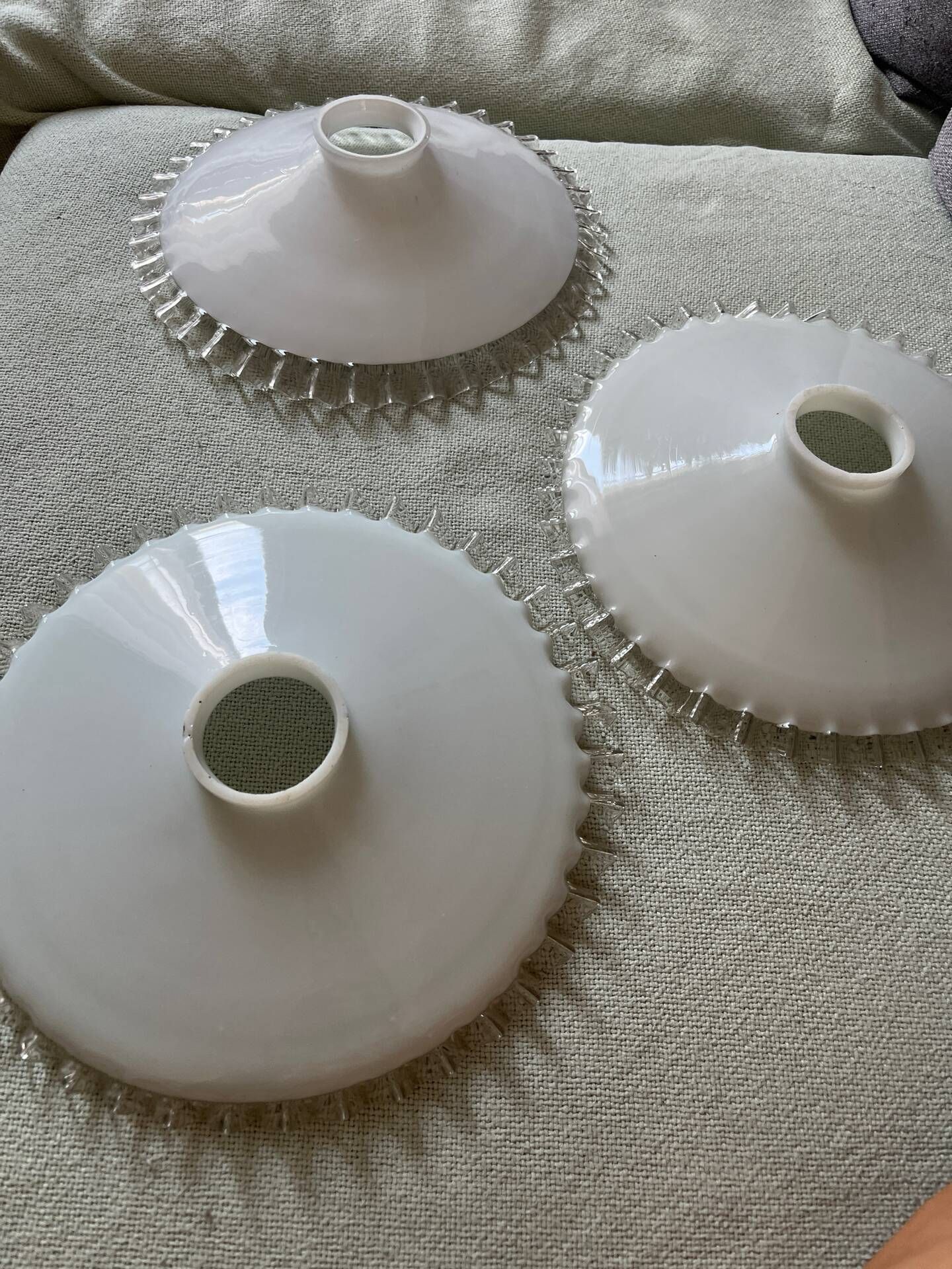 Set of 3 white opaline pendant lamps with scalloped collar.