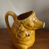 Pig slip pitcher