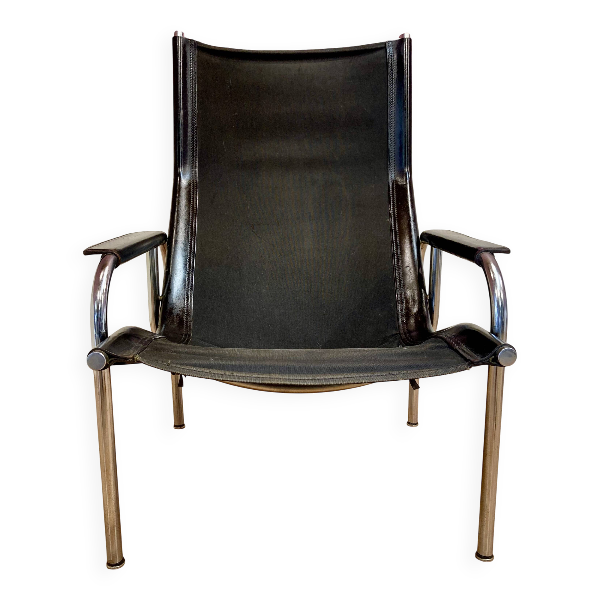 Black leather and chrome reclining armchair designed by "Hans Eichenberger" 1960.