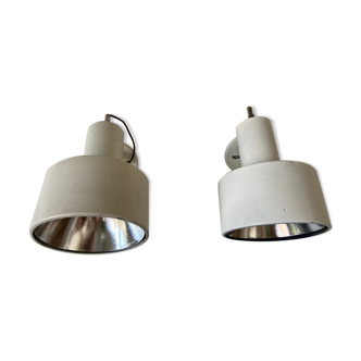 Pair of enamelled sheet metal wall appliques