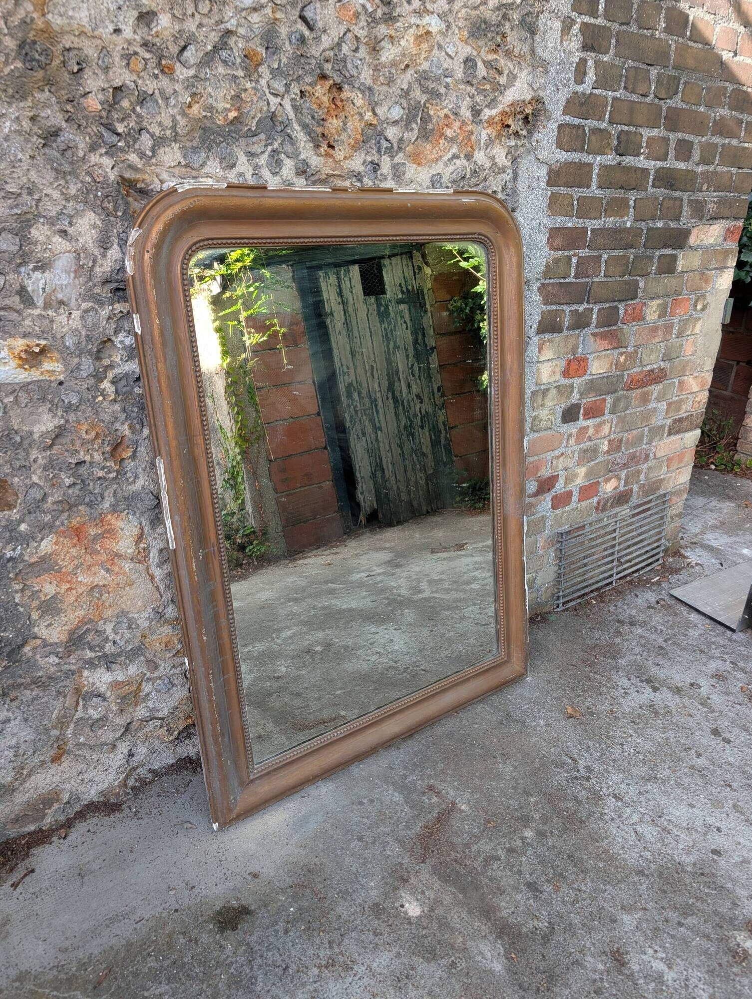 Antique Louis-Philippe trumeau gilded with beaded moulding & lovely patina