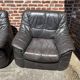 Pair of patinated leather club armchairs