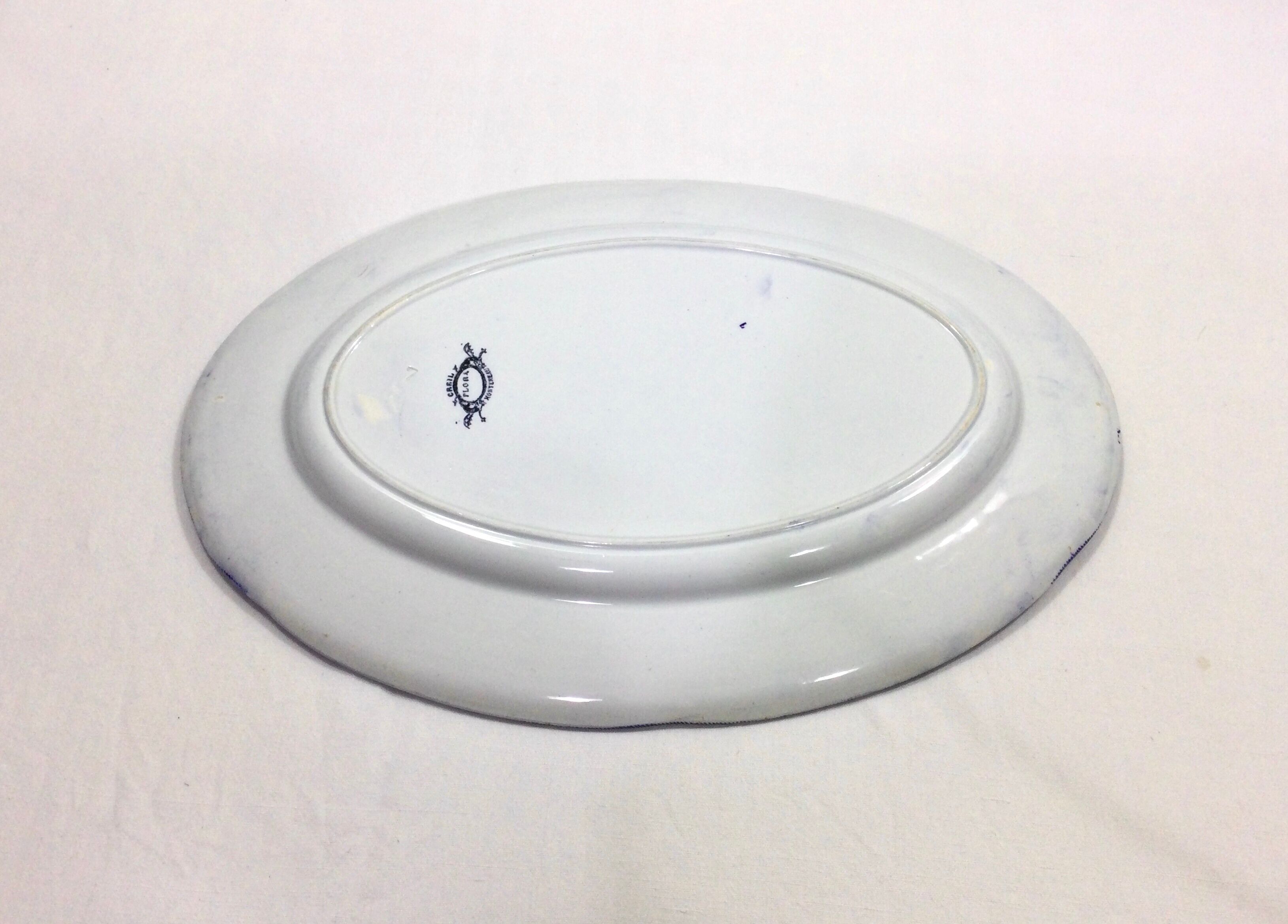 Creil and Montereau - Oval flat in faience model Flora