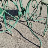 Garden table, two armchairs and a metal chair