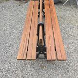 Antique double garden bench from the city of Paris in cast iron and wood