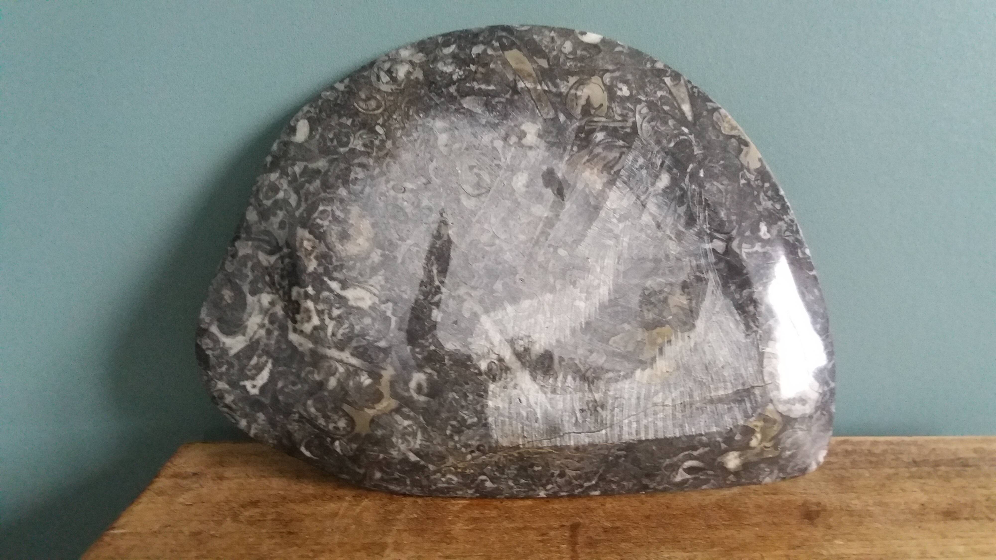 Marble trinket tray with ammonite fossil