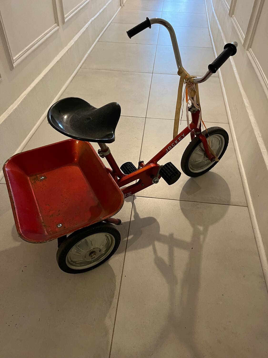 Vintage metal jockey tricycle