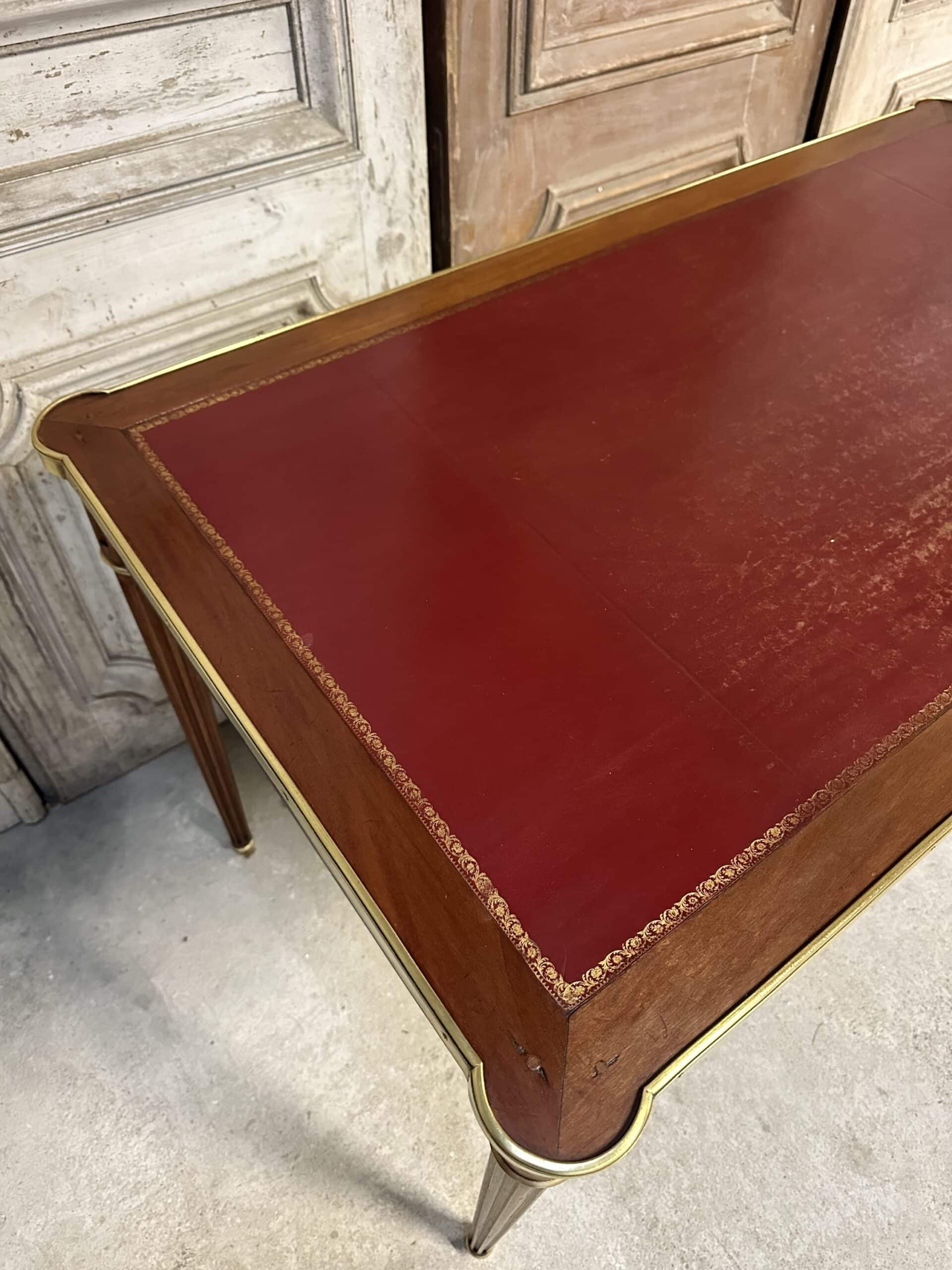 Louis XVI style flat desk in mahogany from around 1950.