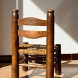 Low fireplace chair attributed to Charles Dudouyt.