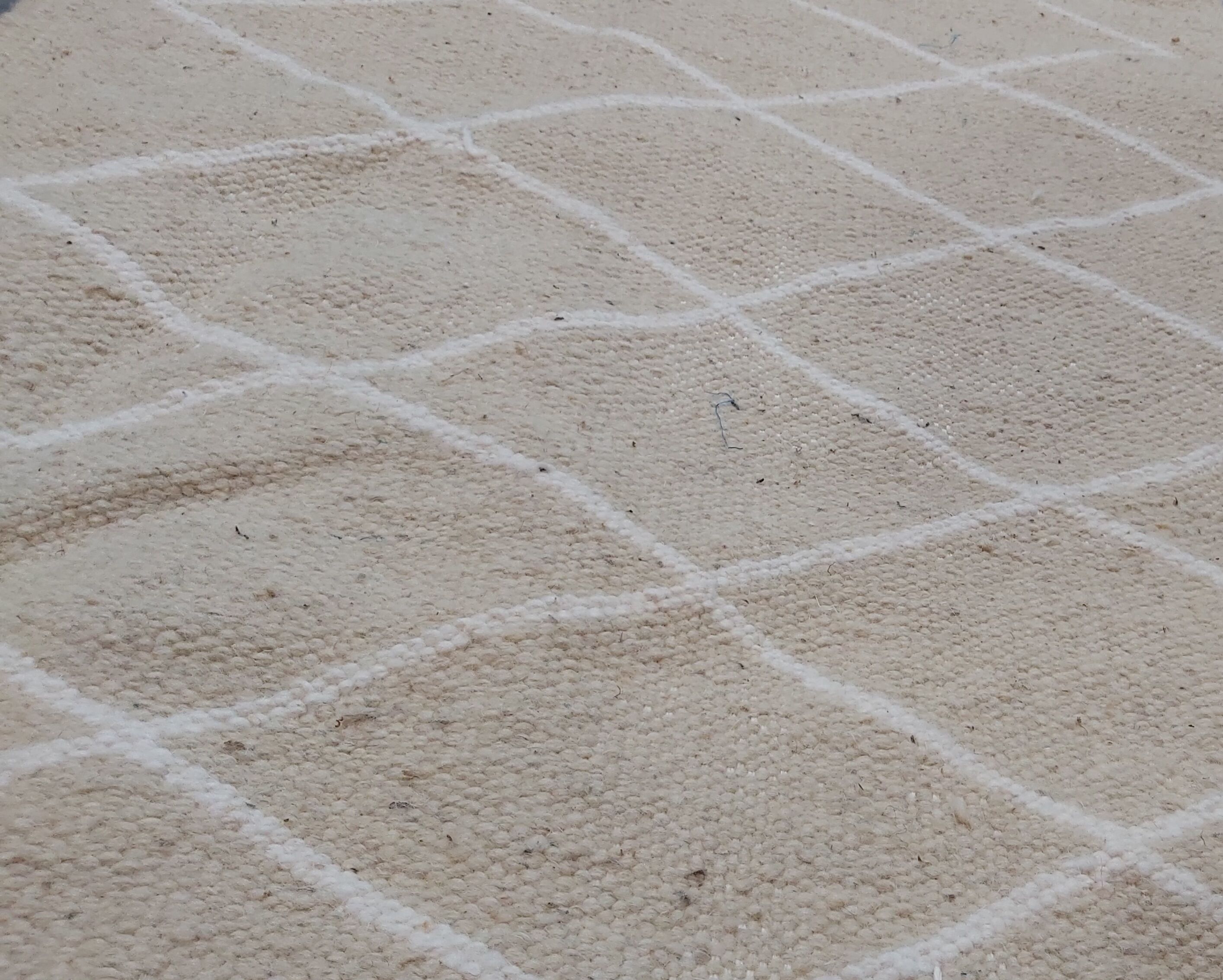 Hand-made beige and white wool rug 65x144cm