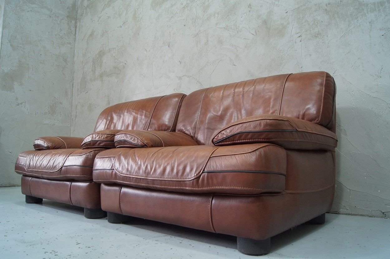 A pair of vintage Italian leather Lounge Chairs, 1970s