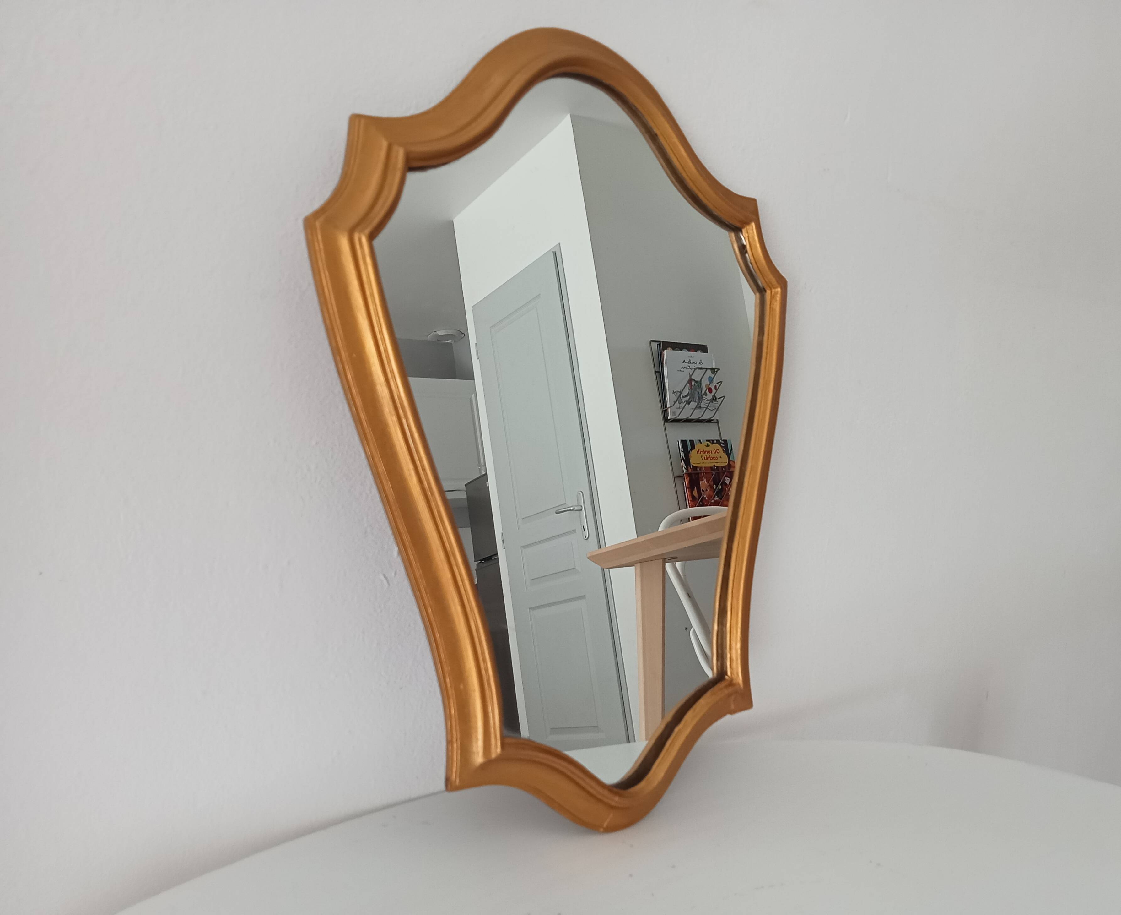 Vintage baroque mirror in gilded wood