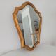 Vintage baroque mirror in gilded wood