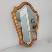Vintage baroque mirror in gilded wood