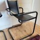 Pair of Cantilever armchairs in leather and black tubular - 1970s