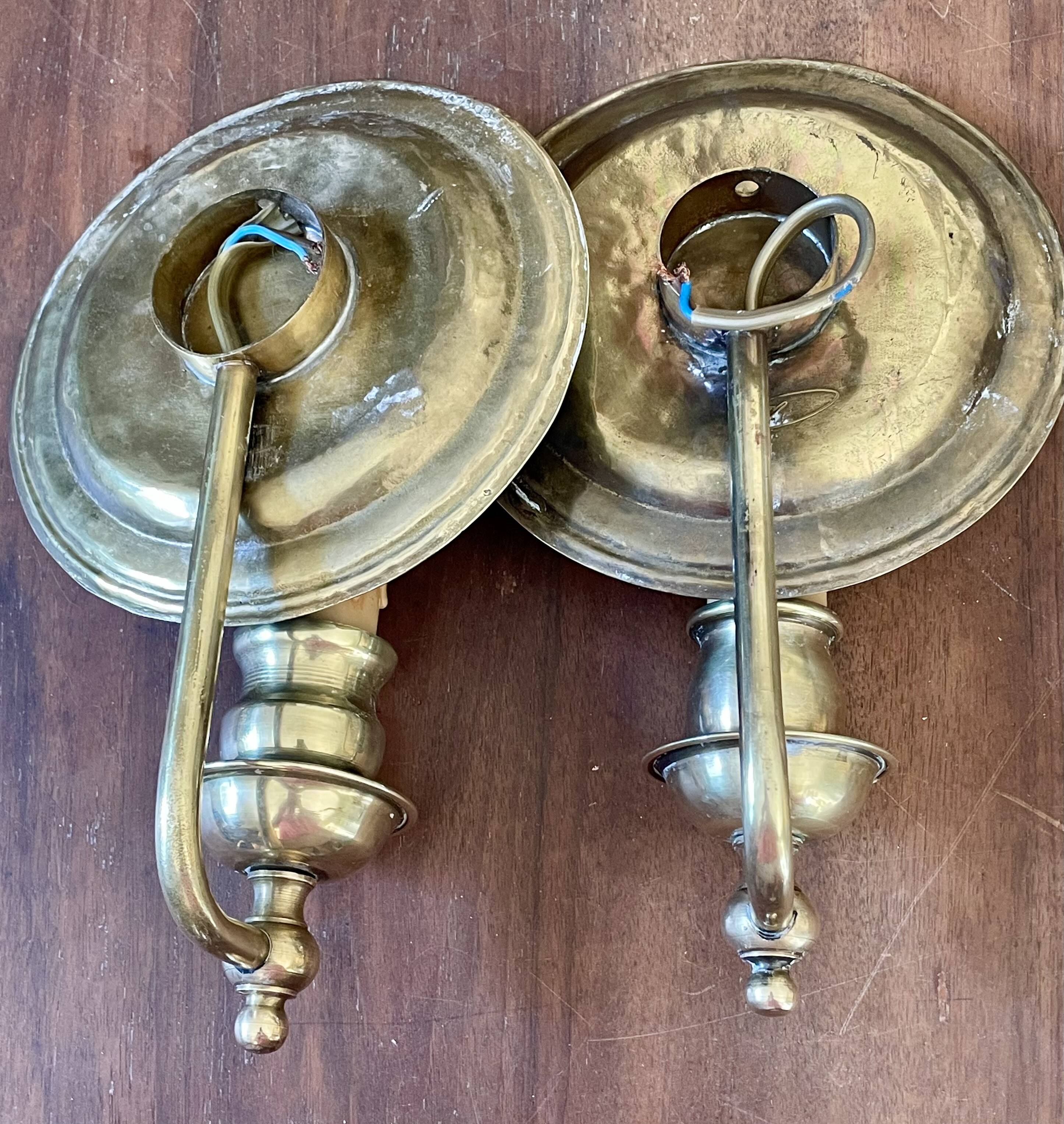 Pair of vintage wall sconces in textured brass, brutalist style.