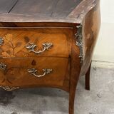 Curved and inlaid Louis XV style chest of drawers