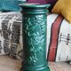 Pedestal column in green ceramic with flower and fruit decoration