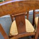 6 Syriel solid cherry wood dining chairs with yellow fabric.