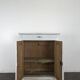 Small buffet with two doors and one drawer in white patinated wood.