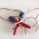 Old wooden jump rope red and blue / vintage