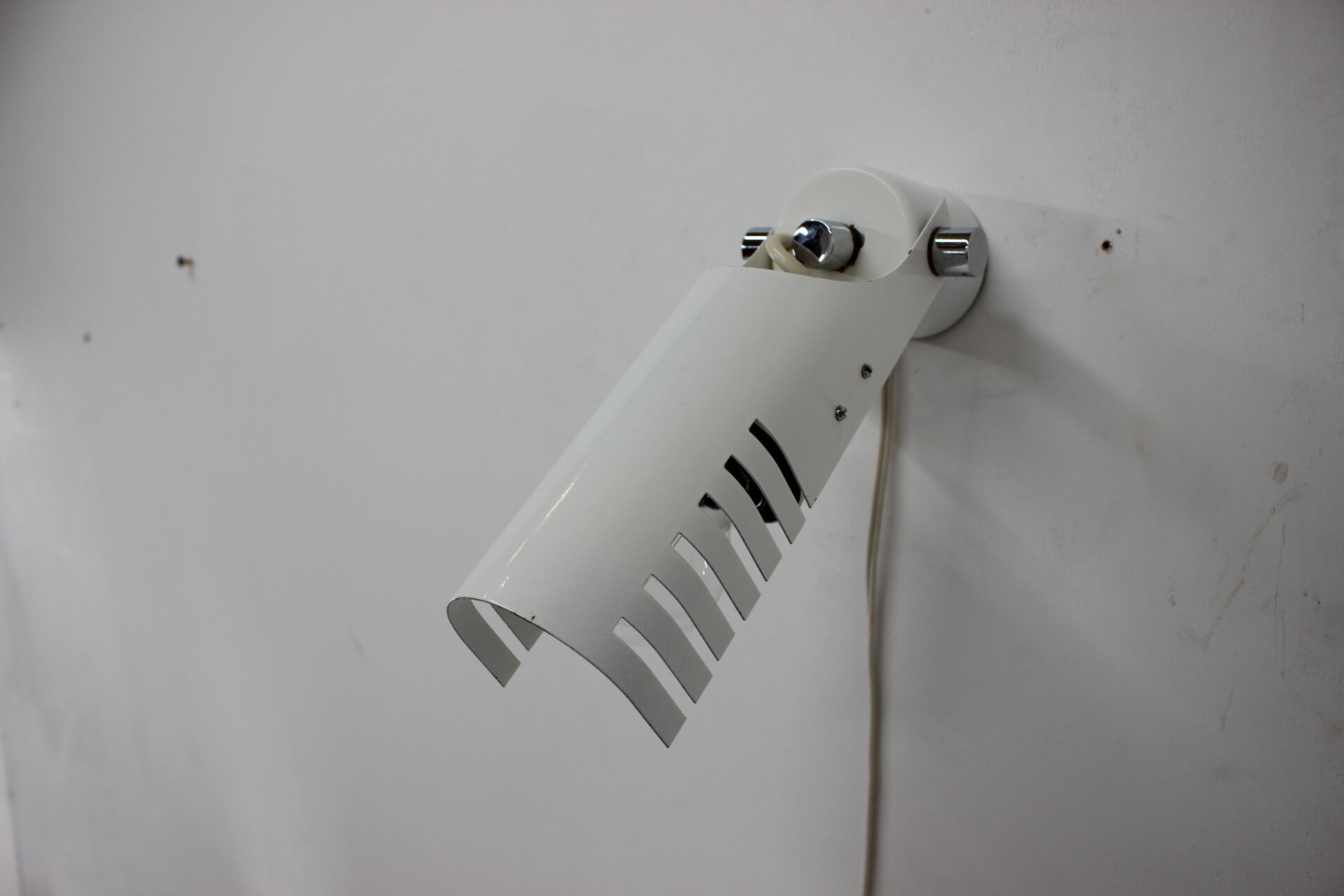 Set of three white adjustable design wall lamp, 1980's.