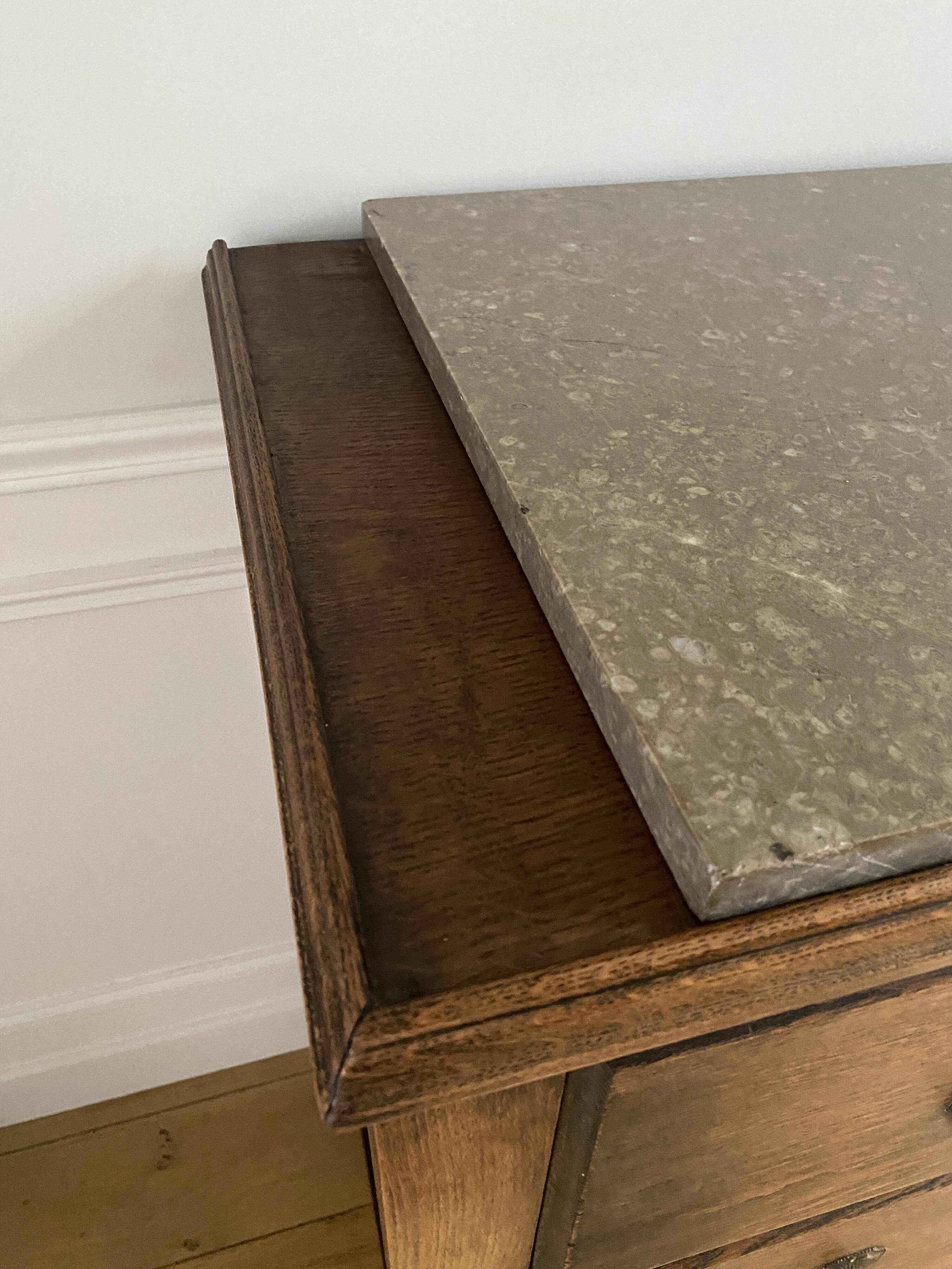 Vintage wooden chest of drawers with three drawers and brown marble top
