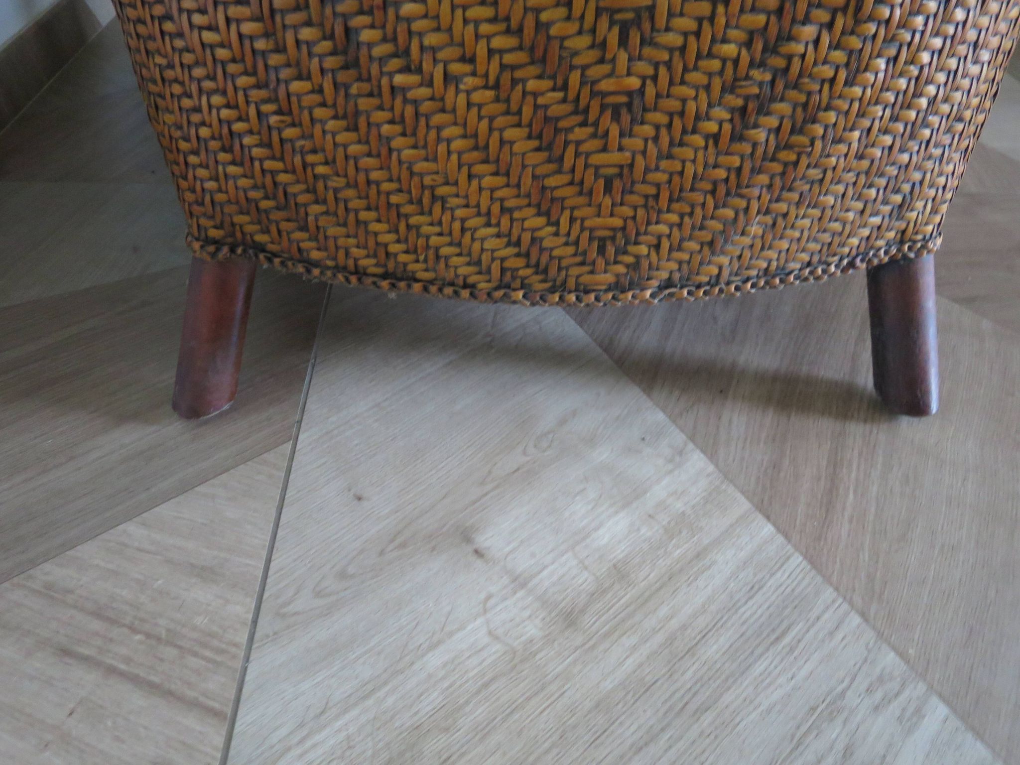Woven rattan armchair and exotic wood in colonial style, 1980s.