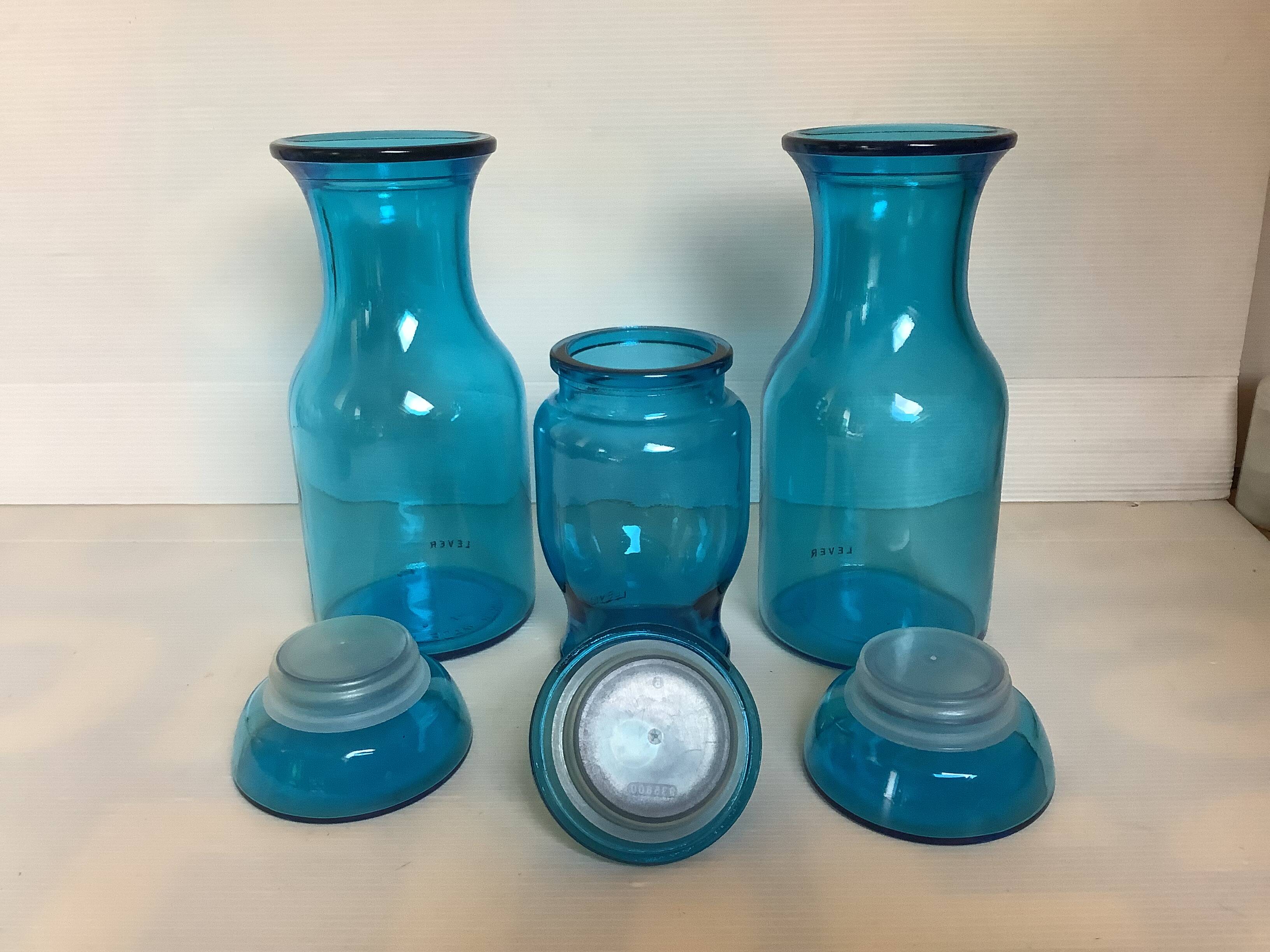 Trio of blue glass candy jars from the 70s