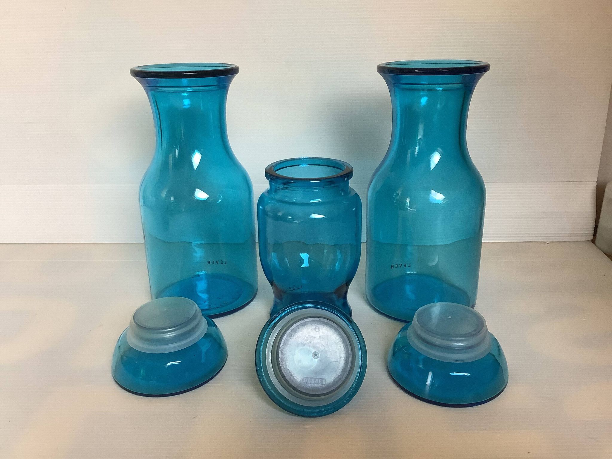 Trio of blue glass candy jars from the 70s