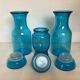 Trio of blue glass candy jars from the 70s