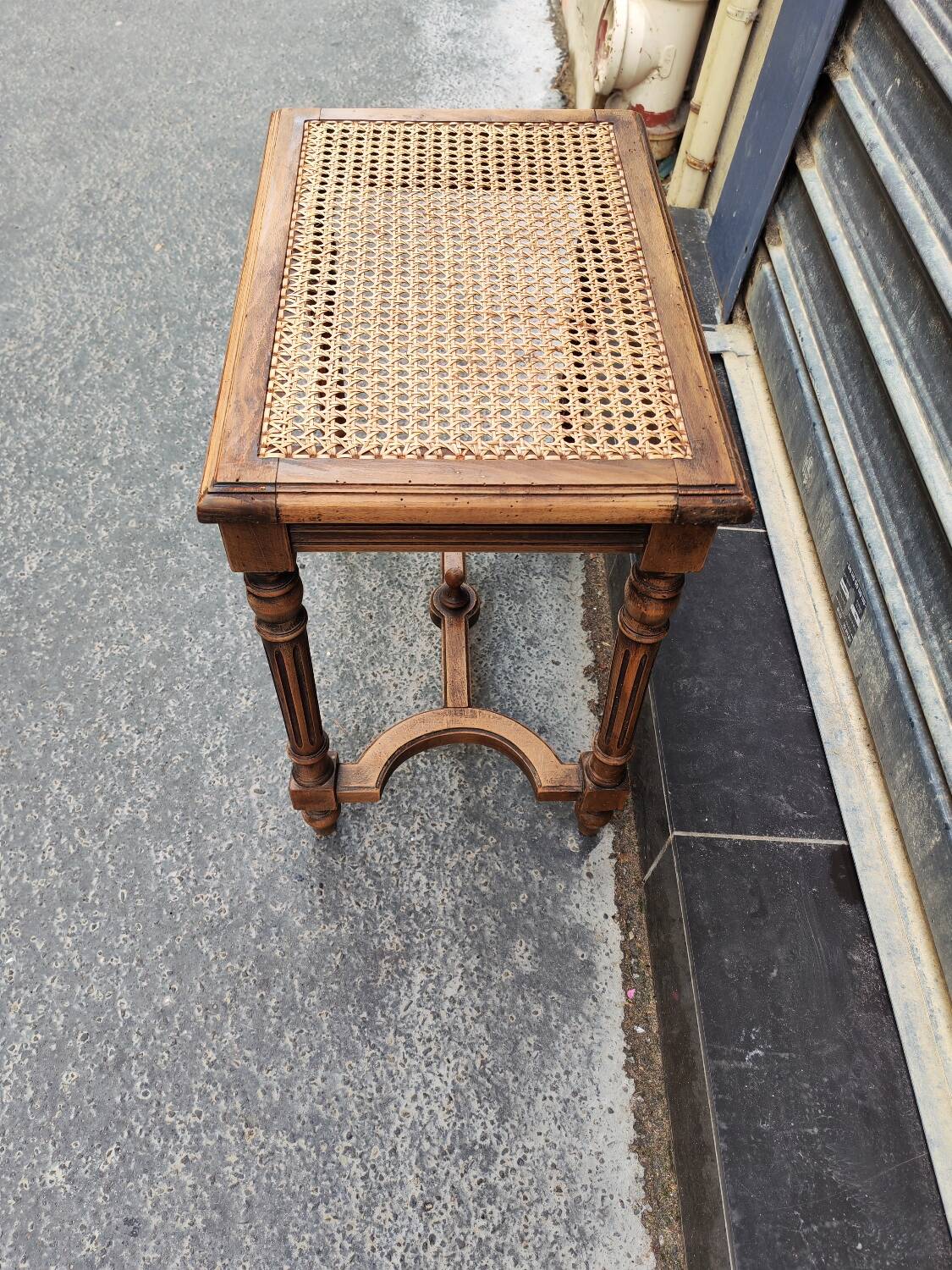 Wooden and cane bench