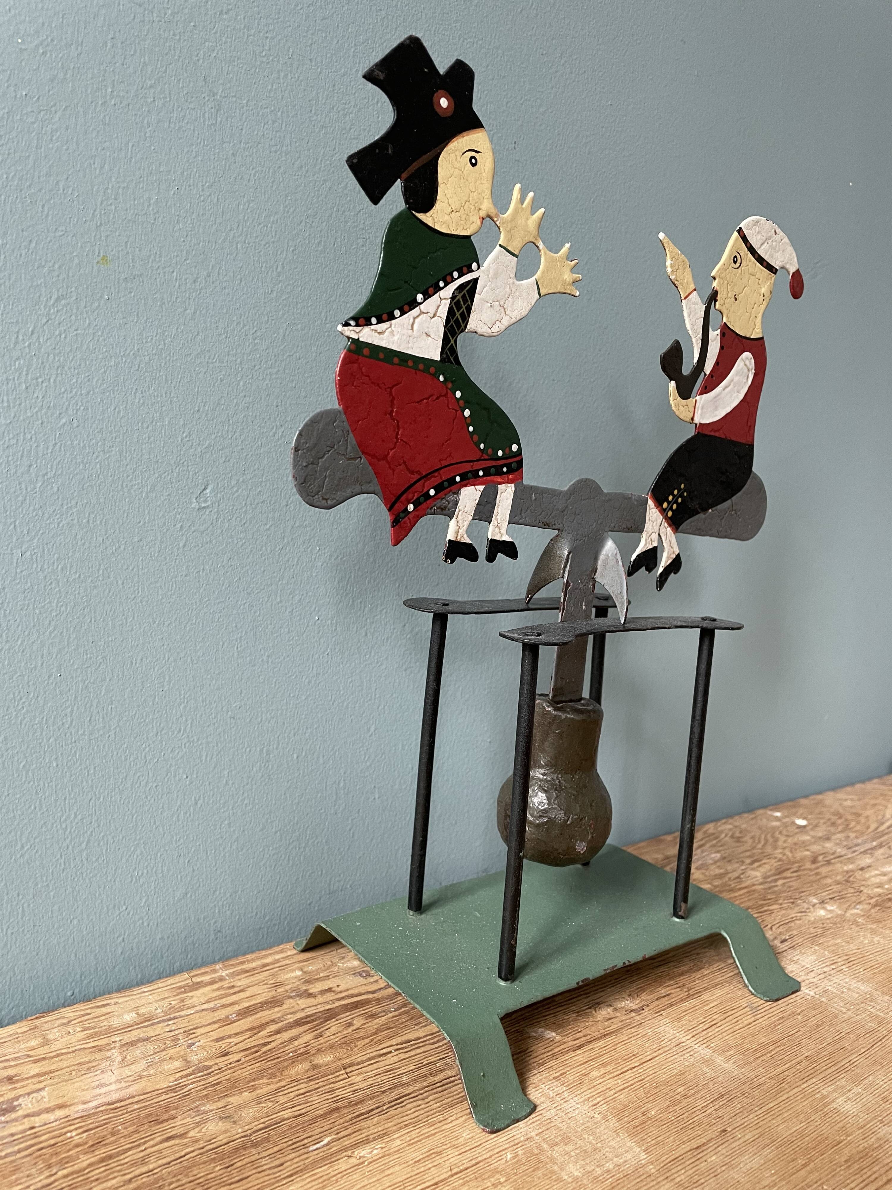 Old mobile toy with pendulum