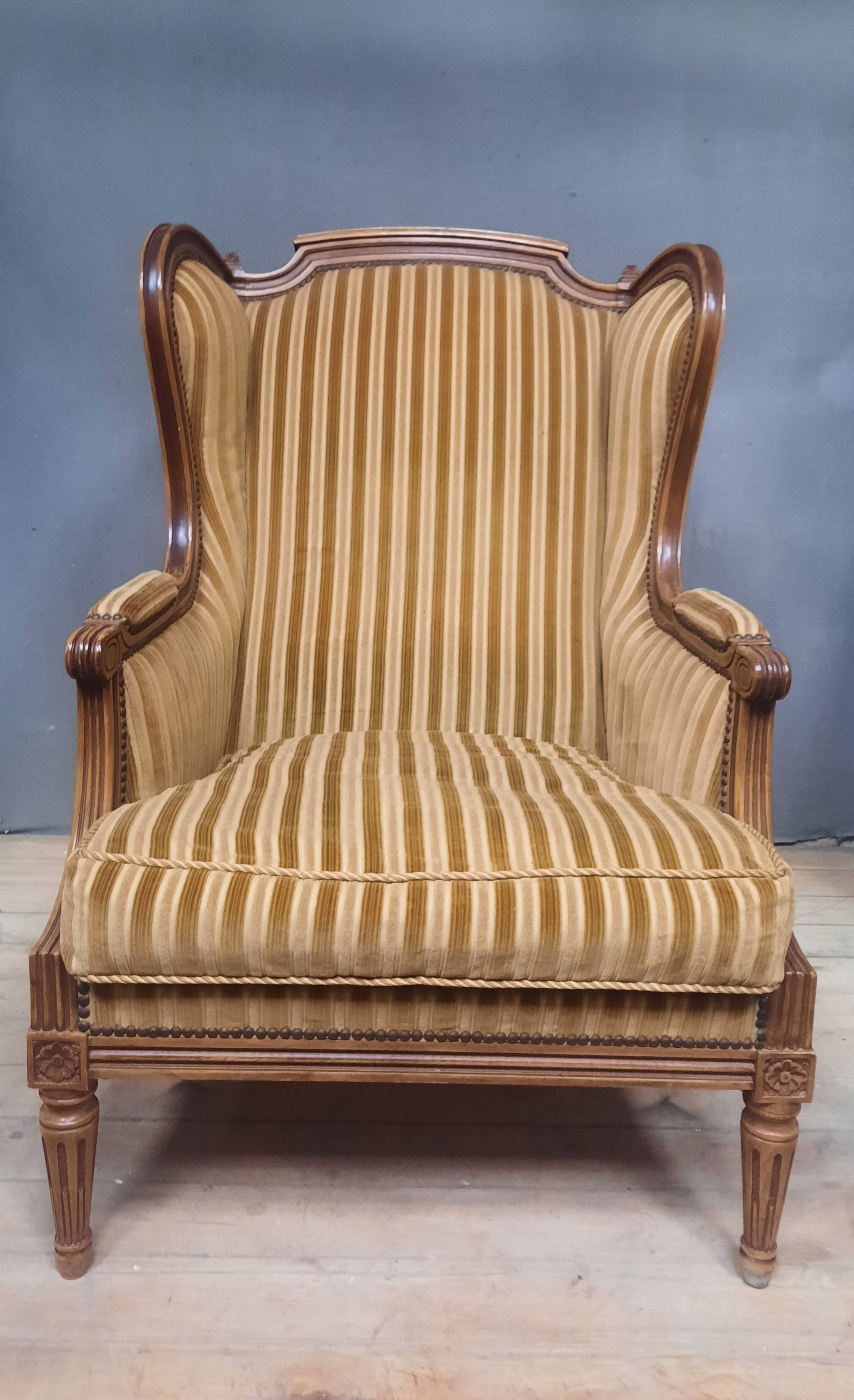 Large Louis XVI style wing chair