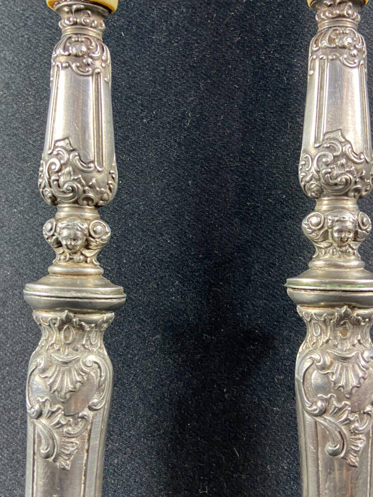 Salad service silver handles Regency decoration with cherub heads