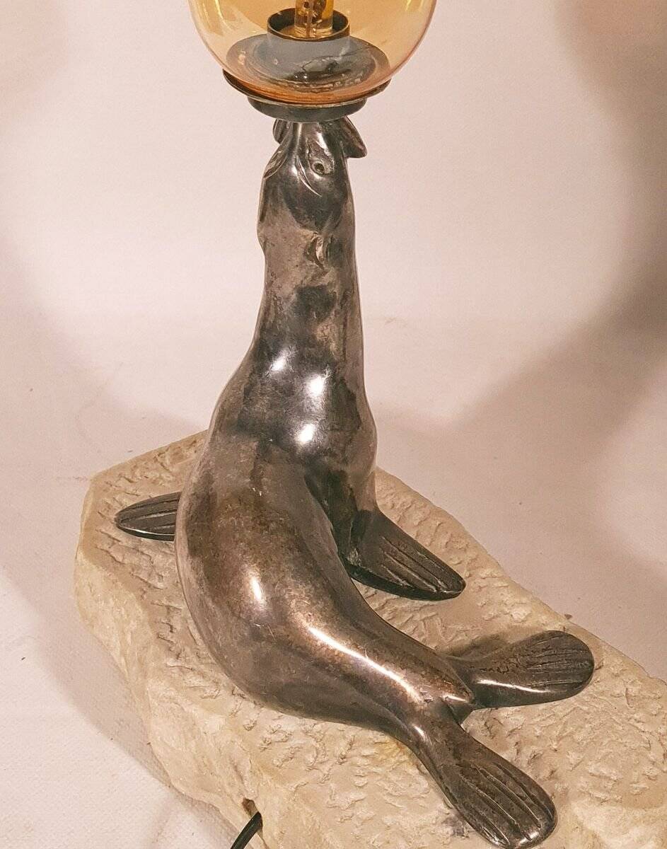 Art Deco "sea lion" lamp in silver-plated bronze