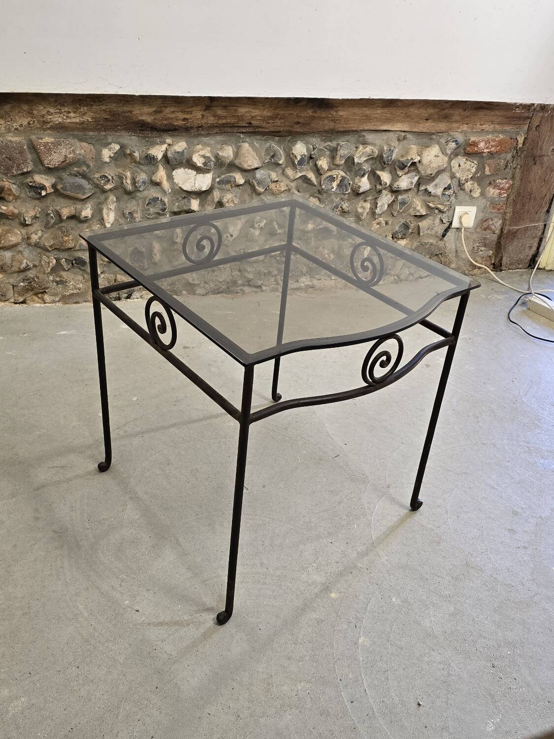 Small side table in wrought iron and smoked glass