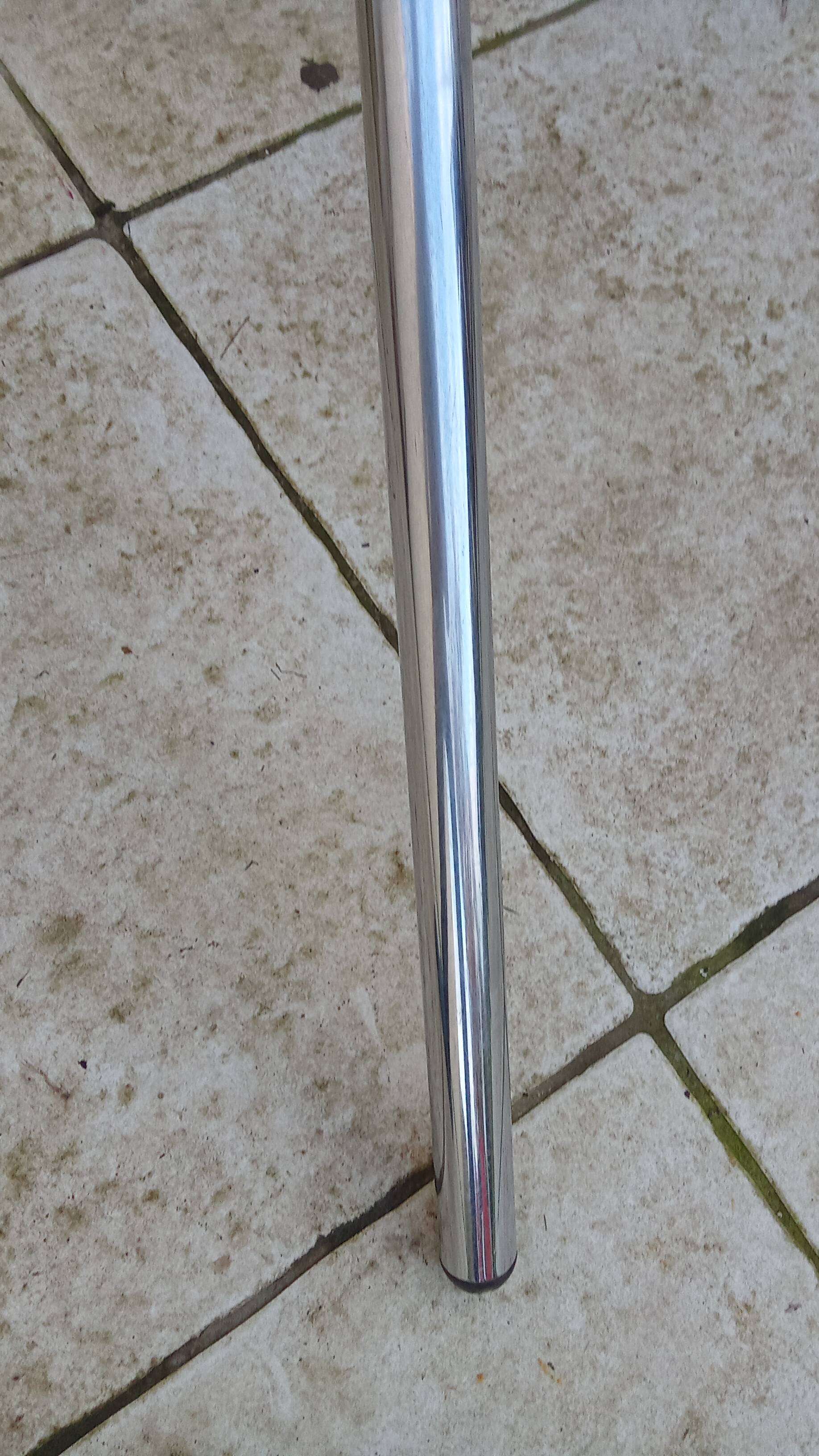 Vintage 70s table with glass and chrome legs.