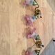 Pair of brass sconces and pink glass