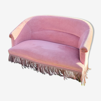 Pink velvet sofa