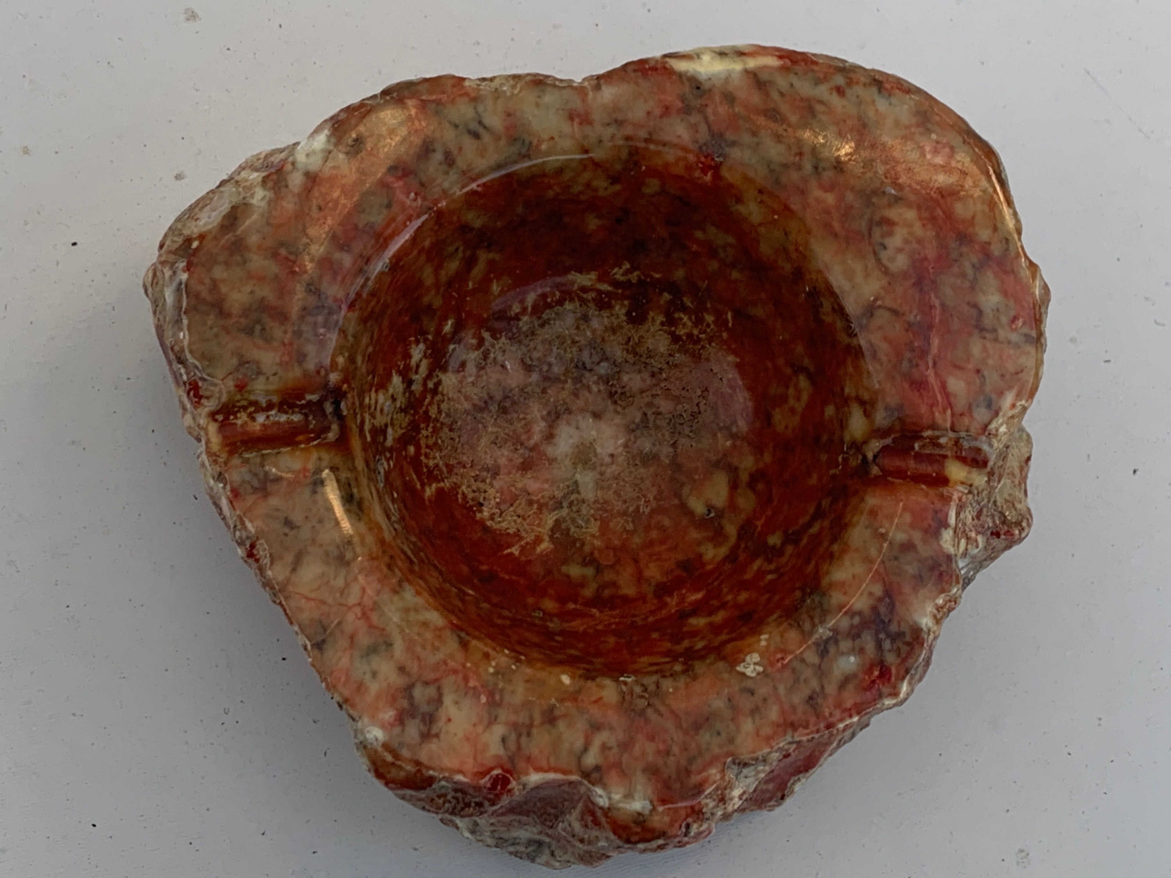 Ashtray in marble stone of vintage cherry color