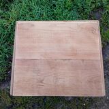 Raw wood bedside table