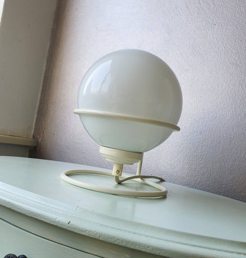 Vintage light bulb lamp on metal support 1980