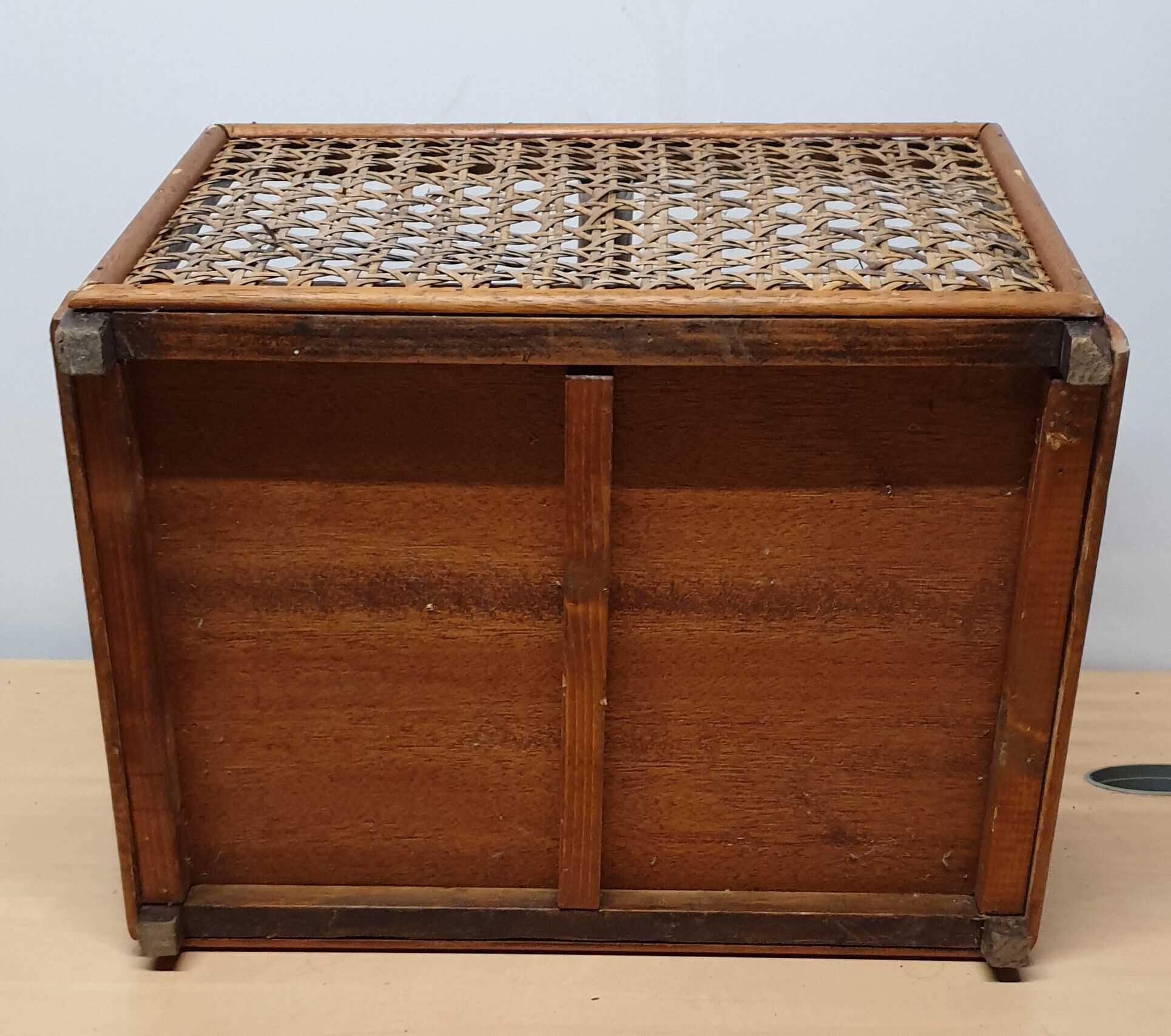 Basket has bamboo cane logs and canning