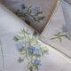 Hand-embroidered table duo in linen voile – Bluebells & Butterfly