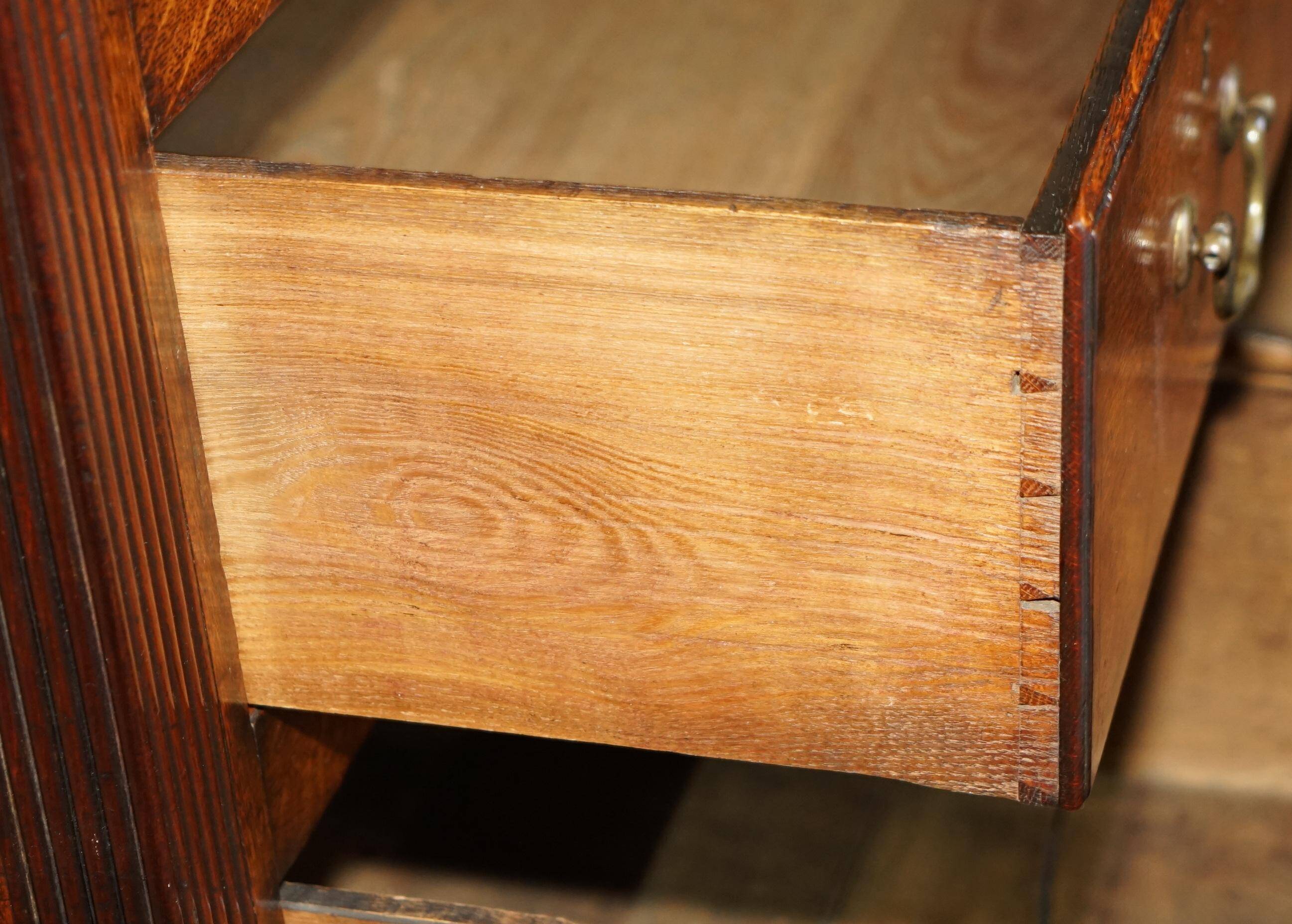Georgian oak commode with a folding top, English, 18th century.