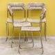 Four straw-seated chairs from 1980.
